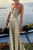 Elegant FJØRNA Celeste women's strapless A-line evening gown with pleated metallic fabric, perfect for formal occasions.