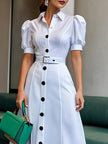 FJØRNA white maxi dress with puff short sleeves, belted waist, button details, and lapel collar, perfect for elegant occasions.