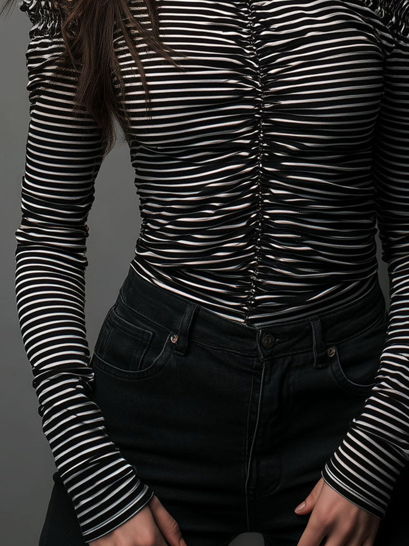 Black striped high neck cold-shoulder T-shirt by FJØRNA with ruched detailing and long sleeves, stylish and trendy for casual wear.