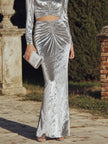 FJØRNA long sleeve ruched cutout evening gown with elegant design, featuring a fitted silhouette and maxi length for formal occasions.