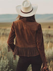 FJØRNA brown suede Western tassel zip-up jacket with fringe details, styled for a casual Western look.