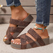 FJØRNA Abigail™ orthopedic leather strap sandals with cushioned soles, shown in black on a model's feet.