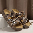FJØRNA Abigail™ orthopedic leather strap sandals with adjustable straps and cushioned soles, shown in black on a model.