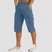 FJØRNA men's stretch cargo pants featuring multiple pockets, comfortable fit, and durable fabric for casual and outdoor wear.