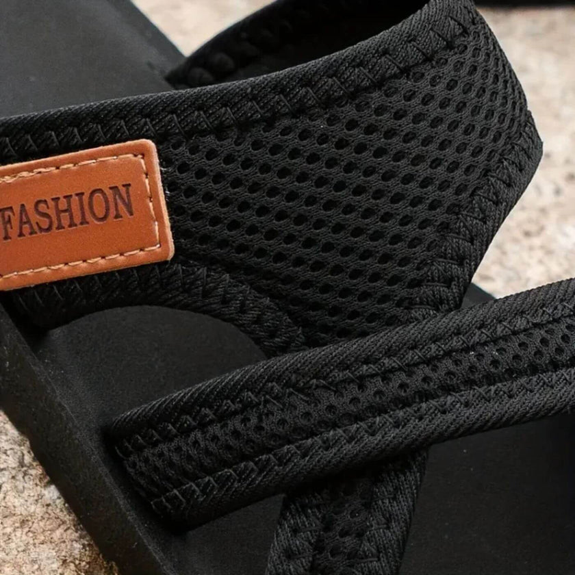 FJØRNA Aiyana™ orthopedic sandals in black with supportive straps and cushioned soles, designed for comfort and style.