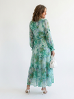 FJØRNA elegant floral maxi dress for women with long sleeves, flowing design, perfect for stylish occasions.