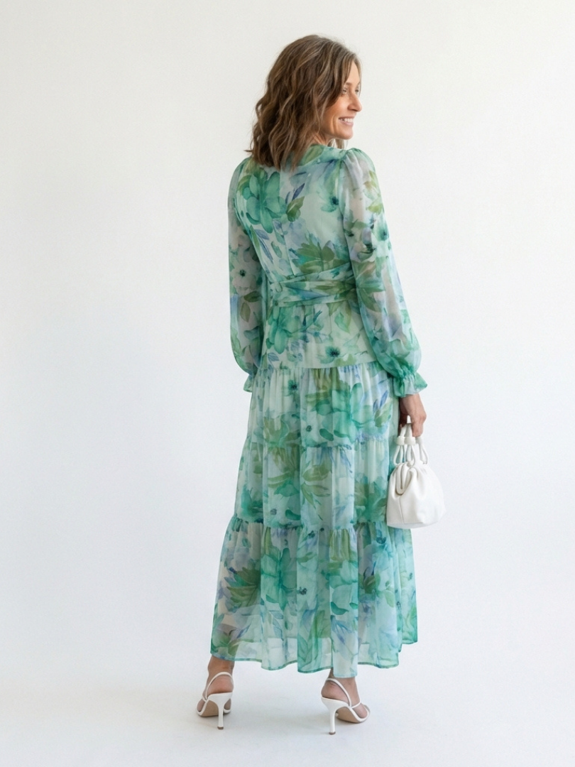 FJØRNA elegant floral maxi dress for women with long sleeves, flowing design, perfect for stylish occasions.