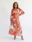 Elegant floral maxi dress for women by FJØRNA featuring long sleeves and a flowing silhouette, perfect for stylish occasions.