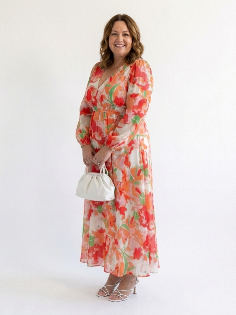 FJØRNA elegant floral maxi dress for women with long sleeves, flowing fabric, perfect for stylish occasions.