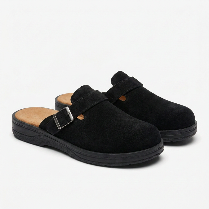 FJØRNA men's PU leather mule clogs with buckle strap, slip-on casual flat shoes shown at an angle.