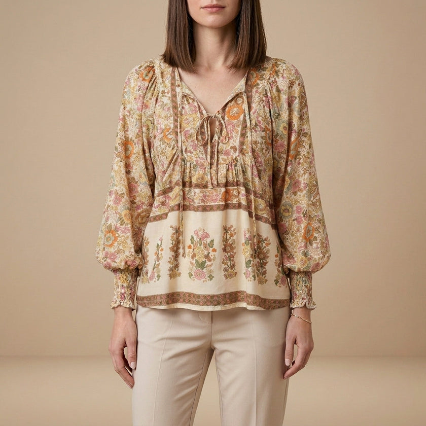 Apricot floral long sleeve linen blouse for women by FJØRNA, featuring a lightweight, breezy summer top with a feminine design.