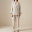 Apricot FJØRNA 2-piece blazer and wide-leg trouser set featuring a relaxed, refined style with tailored fit and soft fabric.