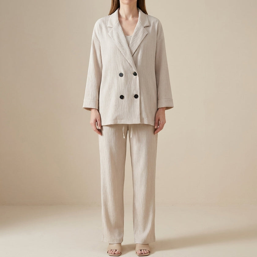 Apricot FJØRNA 2-piece blazer and wide-leg trouser set featuring a relaxed, refined style with tailored fit and soft fabric.