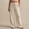Apricot linen summer trousers for women with pockets and drawstring waist by FJØRNA, casual and breathable for warm weather.