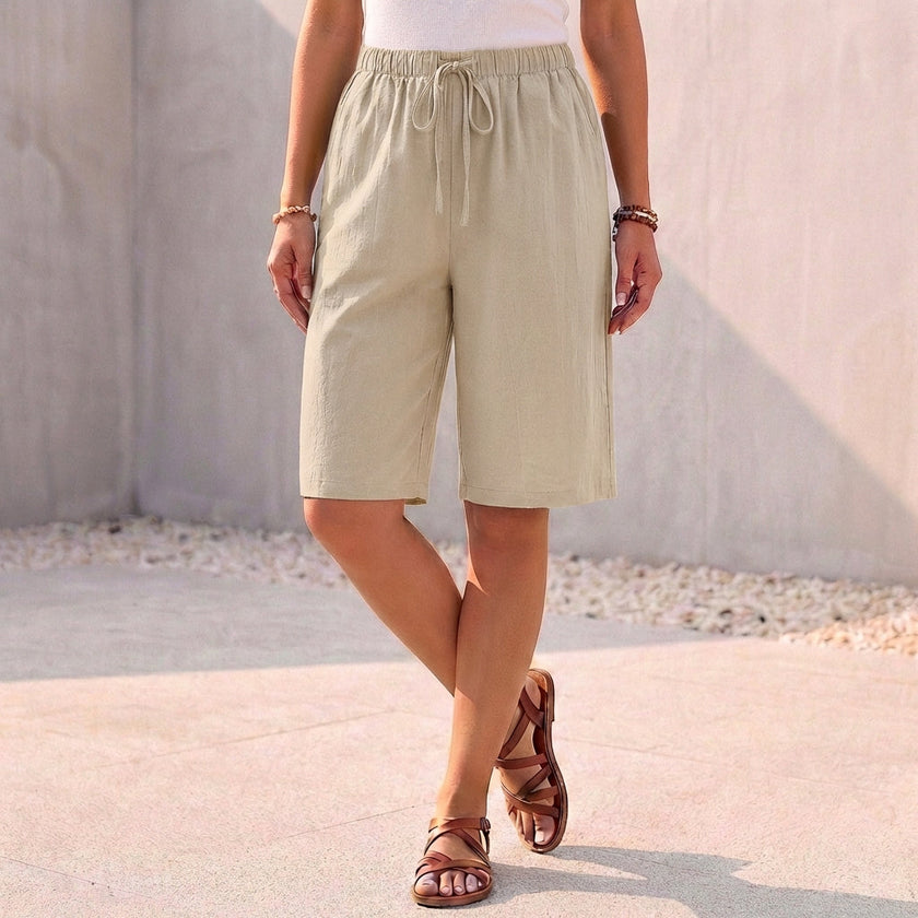 FJØRNA women's apricot cotton summer shorts with drawstring waistband, casual and comfortable for warm weather.