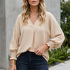 Apricot FJØRNA women's summer blouse with V-neck, denim ruffles, lightweight design, perfect for warm weather.