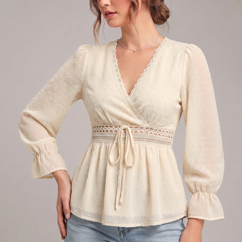 Apricot FJØRNA women's summer blouse with V-neck and ruffle details, made of lightweight linen fabric, perfect for warm weather.