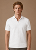 Men's FJØRNA luxury knit polo shirt with soft textured fabric, breathable summer design, ideal for stylish, comfortable wear.