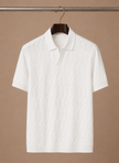 Men's FJØRNA luxury knit polo shirt featuring a soft textured fabric, perfect for breathable summer style.