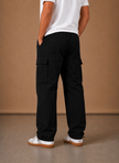 Men's cargo pants by FJØRNA featuring a relaxed fit, utility design, and casual style, shown in a comfortable everyday wear fit.