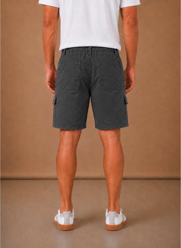Men’s cargo shorts by FJØRNA with relaxed fit, utility pockets, casual summer style, shown in neutral color.