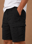 Men's cargo shorts in relaxed fit by FJØRNA, featuring utility pockets and casual summer style.