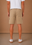 Men's cargo shorts in relaxed utility fit by FJØRNA, featuring multiple pockets and casual summer style.