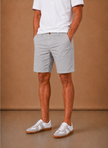 Men's FJØRNA chino shorts in cotton blend, tailored fit, smart casual design, shown on a model with a neutral background.