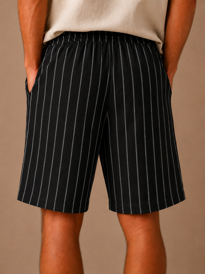 Men's linen drawstring shorts by FJØRNA with relaxed fit and white striped pattern, casual men's pants for warm weather.