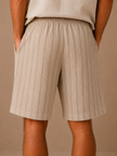 Men's linen drawstring shorts by FJØRNA with white and striped pattern, relaxed fit, casual style, and breathable linen blend fabric.