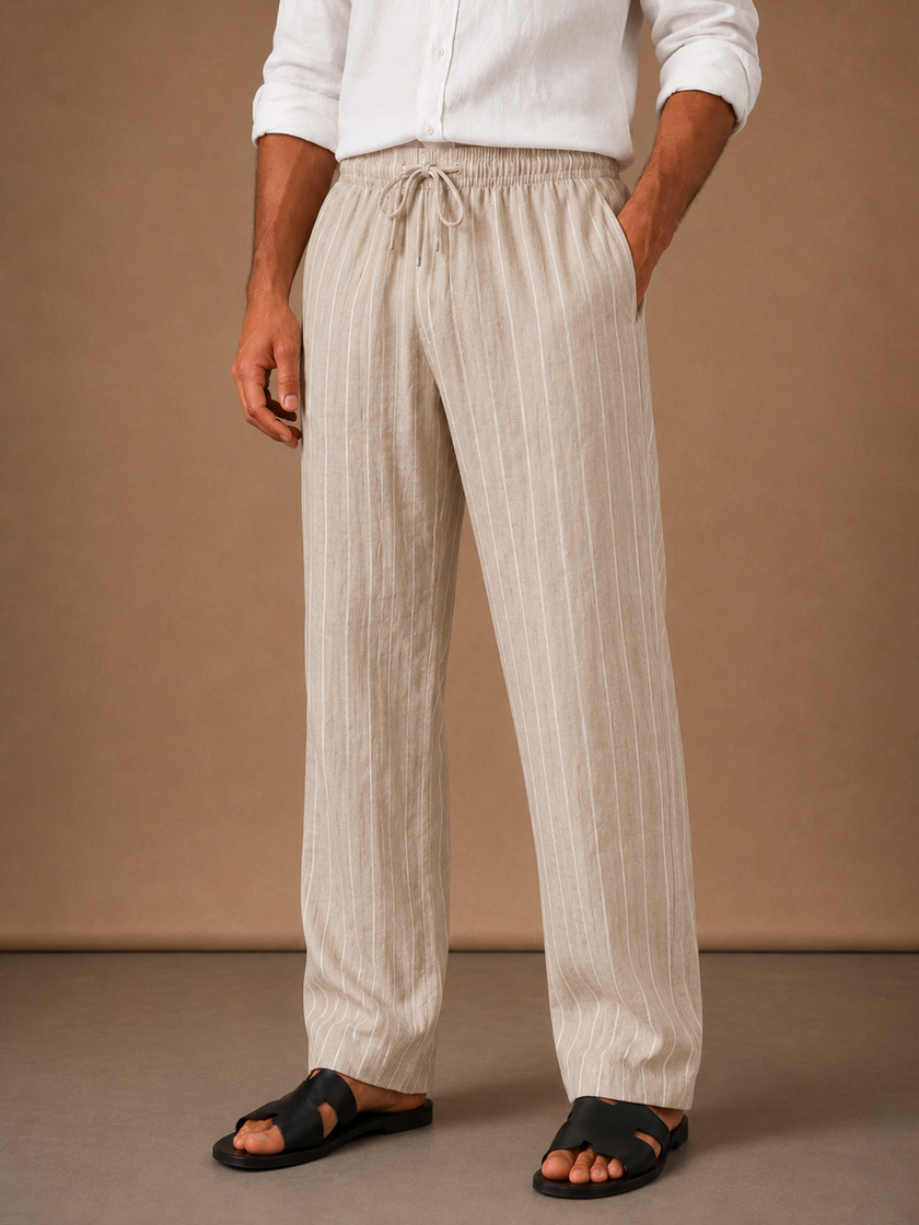 Men's linen drawstring trousers by FJØRNA with relaxed fit and striped casual style, shown in a natural relaxed stance.
