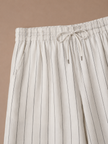 Men's linen drawstring trousers by FJØRNA with relaxed fit and striped casual design, featuring a comfortable drawstring waistband.