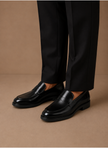 FJØRNA men's leather penny loafers in classic smart casual style, featuring smooth leather and slip-on design.