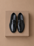 FJØRNA men's leather penny loafers in classic smart casual style, featuring smooth leather and slip-on design for everyday wear.