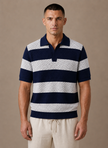 Men's striped polo shirt by FJØRNA featuring a smart casual fit, shown in a close-up of the shirt's striped pattern and collar.