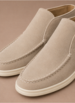 FJØRNA men's suede ankle loafers with moc-toe design, perfect for smart casual style, shown in a close-up view.