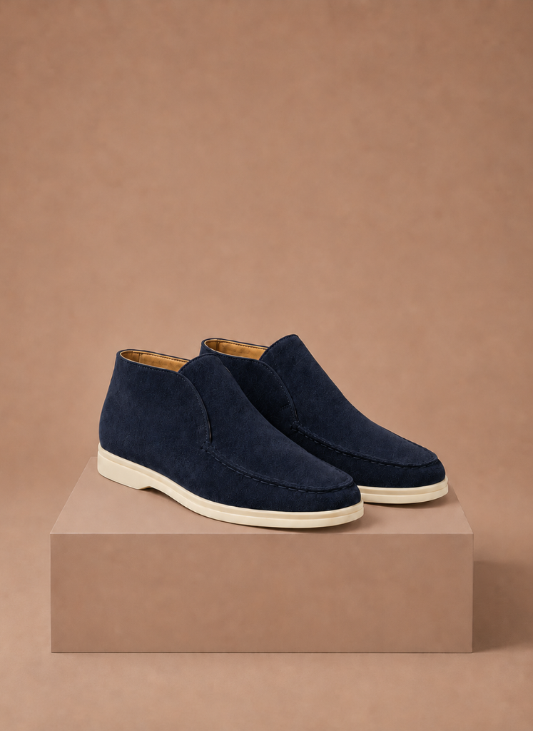 Men's suede ankle loafers by FJØRNA with moc-toe design, ideal for smart casual occasions, shown in a close-up view.
