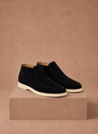 FJØRNA men's suede ankle loafers with moc toe design, ideal for smart casual style, shown on a model's feet.
