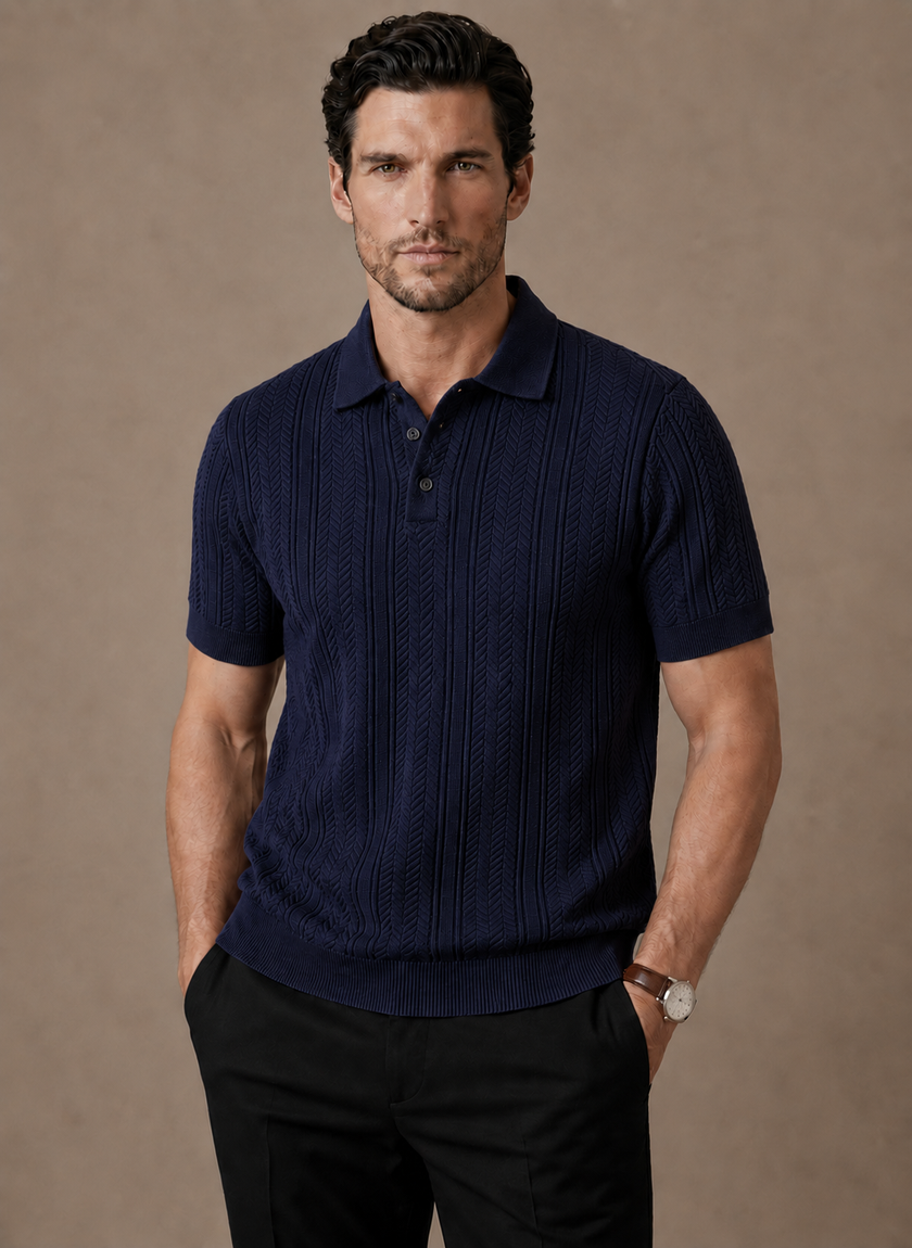 Men's FJØRNA summer polo shirt, slim fit, breathable cotton, casual style, shown in a close-up of the shirt's fabric and collar.