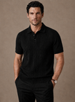 Men's FJØRNA summer polo shirt in breathable, slim fit casual style, shown in a relaxed fit on a model.