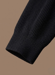 Men's breathable knit cardigan sweater by FJØRNA, showcasing a smart casual layered look with a cozy, textured knit design.