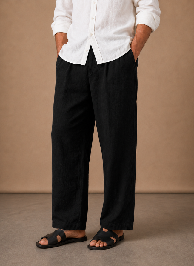 Men's relaxed fit linen cotton summer trousers by FJØRNA, shown in a casual, comfortable style with a light fabric appearance.