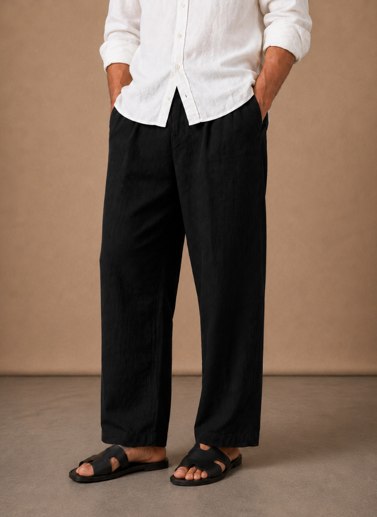 Men's relaxed fit linen cotton summer trousers by FJØRNA, shown in a casual, comfortable style with a light fabric appearance.