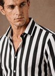 Men's striped button-down shirt by FJØRNA, perfect for smart casual summer outfits, featuring a classic pattern and comfortable fit.