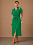 Elegant women's sleeveless formal dress by FJØRNA, lightweight and perfect for special occasions, shown from the front.