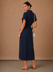 Elegant women's sleeveless formal dress by FJØRNA, lightweight and stylish, perfect for special occasions.