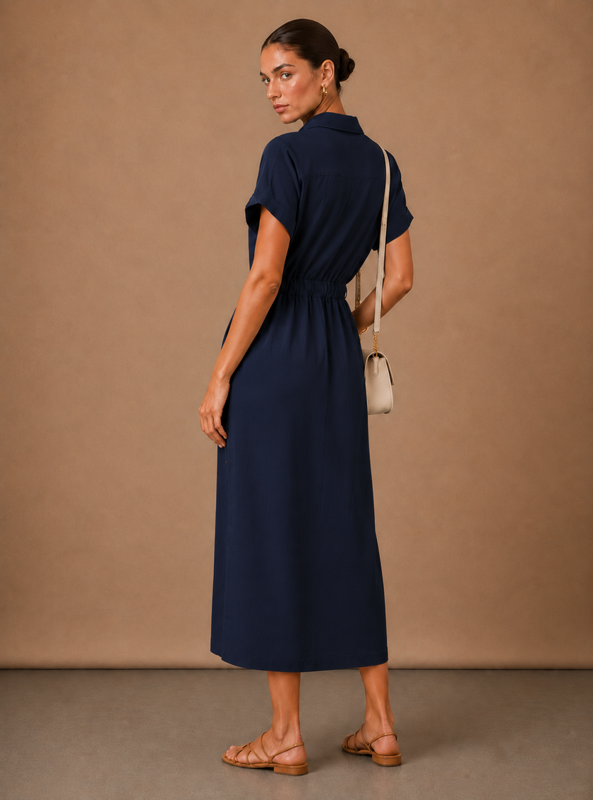 Elegant women's sleeveless formal dress by FJØRNA, lightweight and stylish, perfect for special occasions.