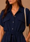 Elegant women's sleeveless formal dress by FJØRNA, lightweight and stylish, perfect for special occasions.