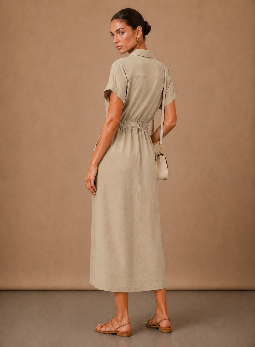 Elegant women's sleeveless formal dress by FJØRNA, lightweight and stylish, perfect for special occasions.