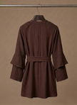 FJØRNA women's ruffle hem mini dress with long sleeves and belted waist, featuring a stylish and feminine design.